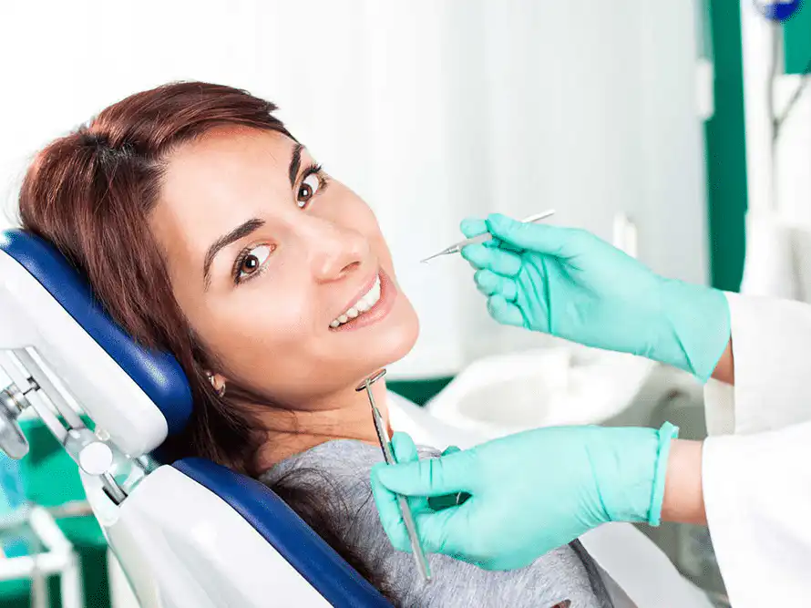 woman at dentist office girl with lost filling